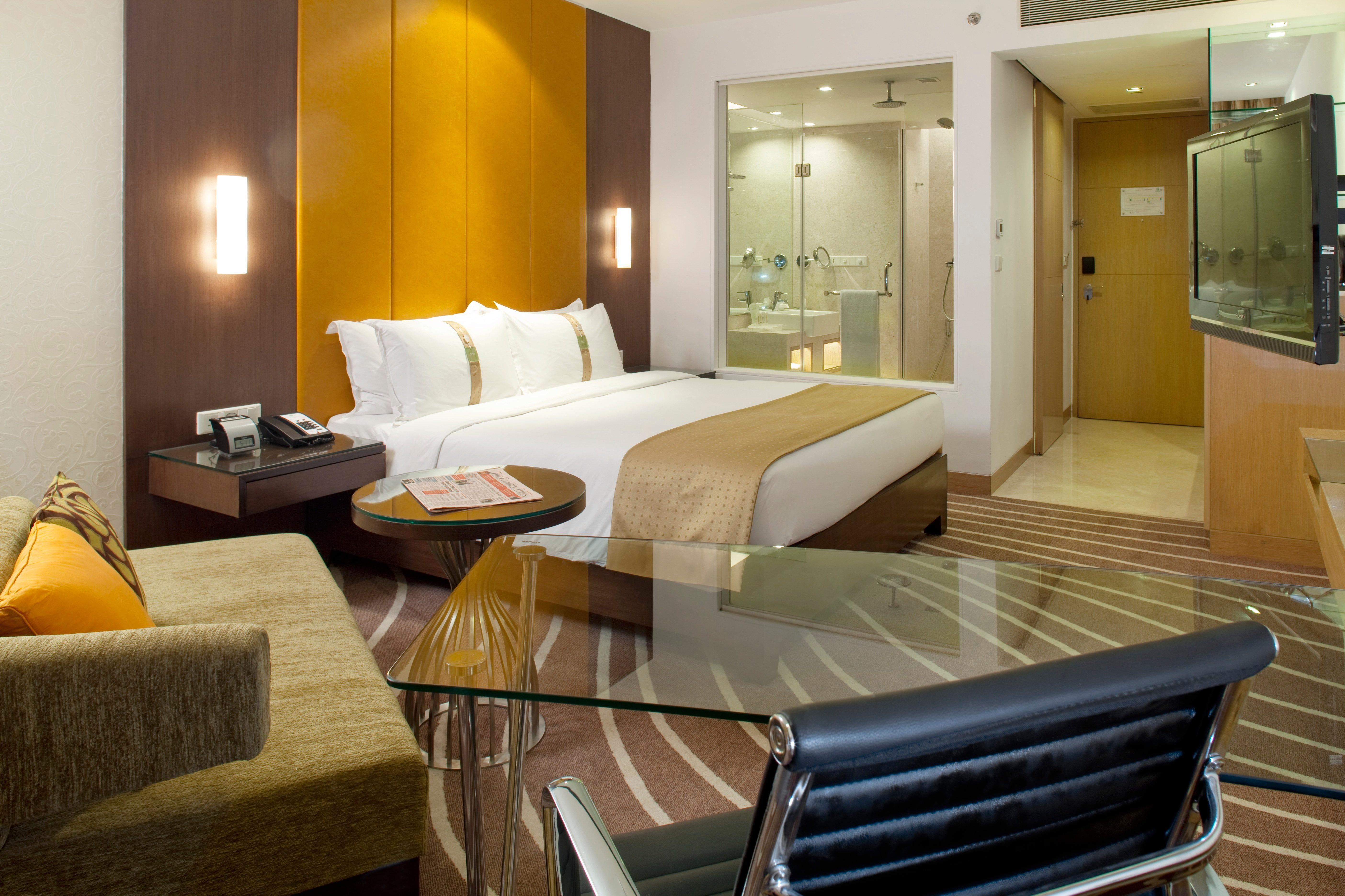 ホリデイ イン ムンバイ インターナショナル エアポート エクステリア 写真 A typical room at the Holiday Inn