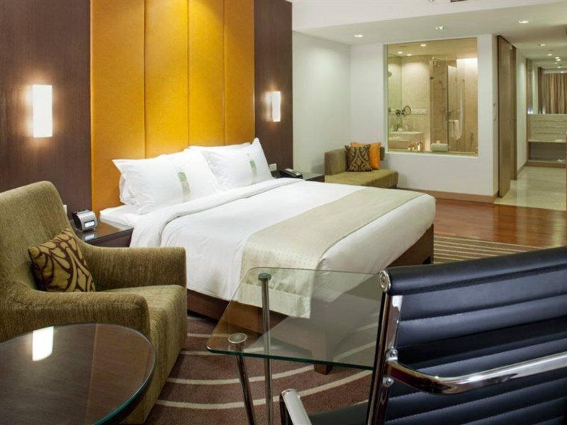ホリデイ イン ムンバイ インターナショナル エアポート エクステリア 写真 A suite at the hotel